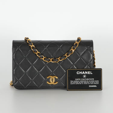 Chanel cute mini black vintage bag ref. 7969