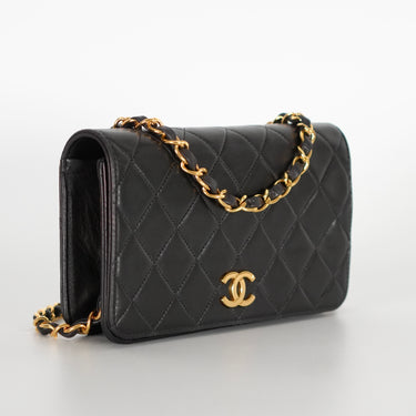 Chanel cute mini black vintage bag ref. 7969
